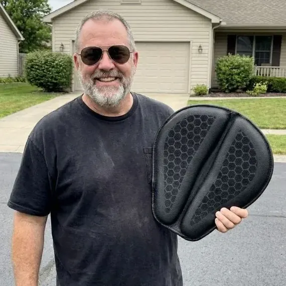 Dave H. showing his SelleZen cushion outside his house